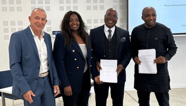 Photographie des signataires du partenariat entre la MUGEF-CI et Innovi